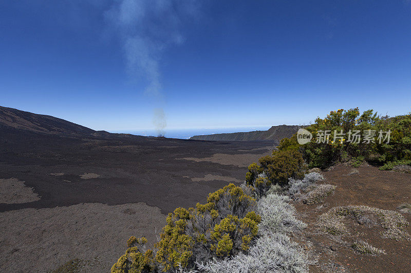 volcano smoke of piton de la fournaise volcano, reunion island